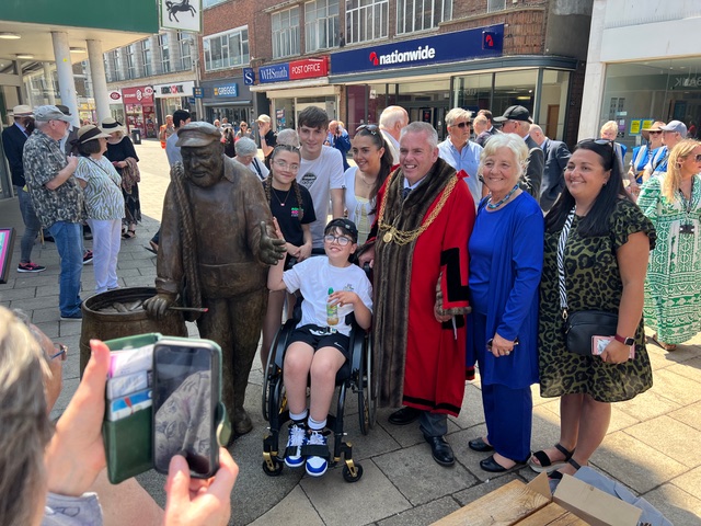 Ernie's family with the Yarn with Ernie statue after its unveiling by the Mayor